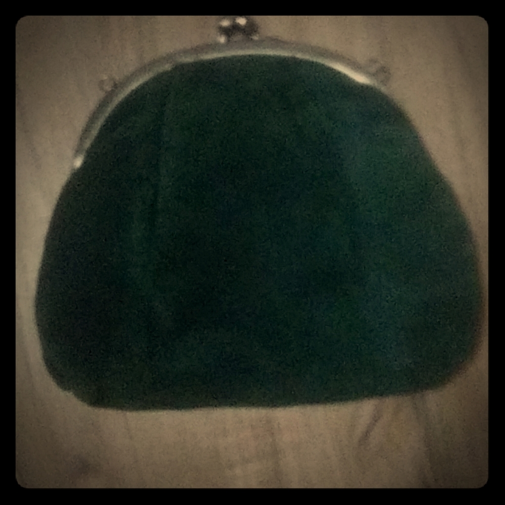 Deep green clutch bag